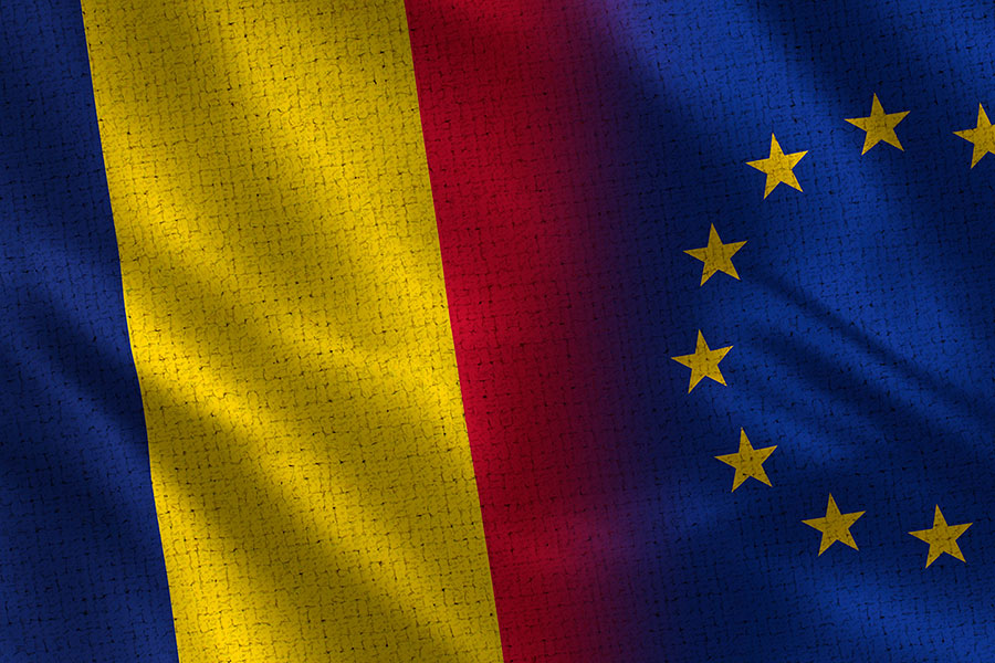 Two flags signifying unification and merger.